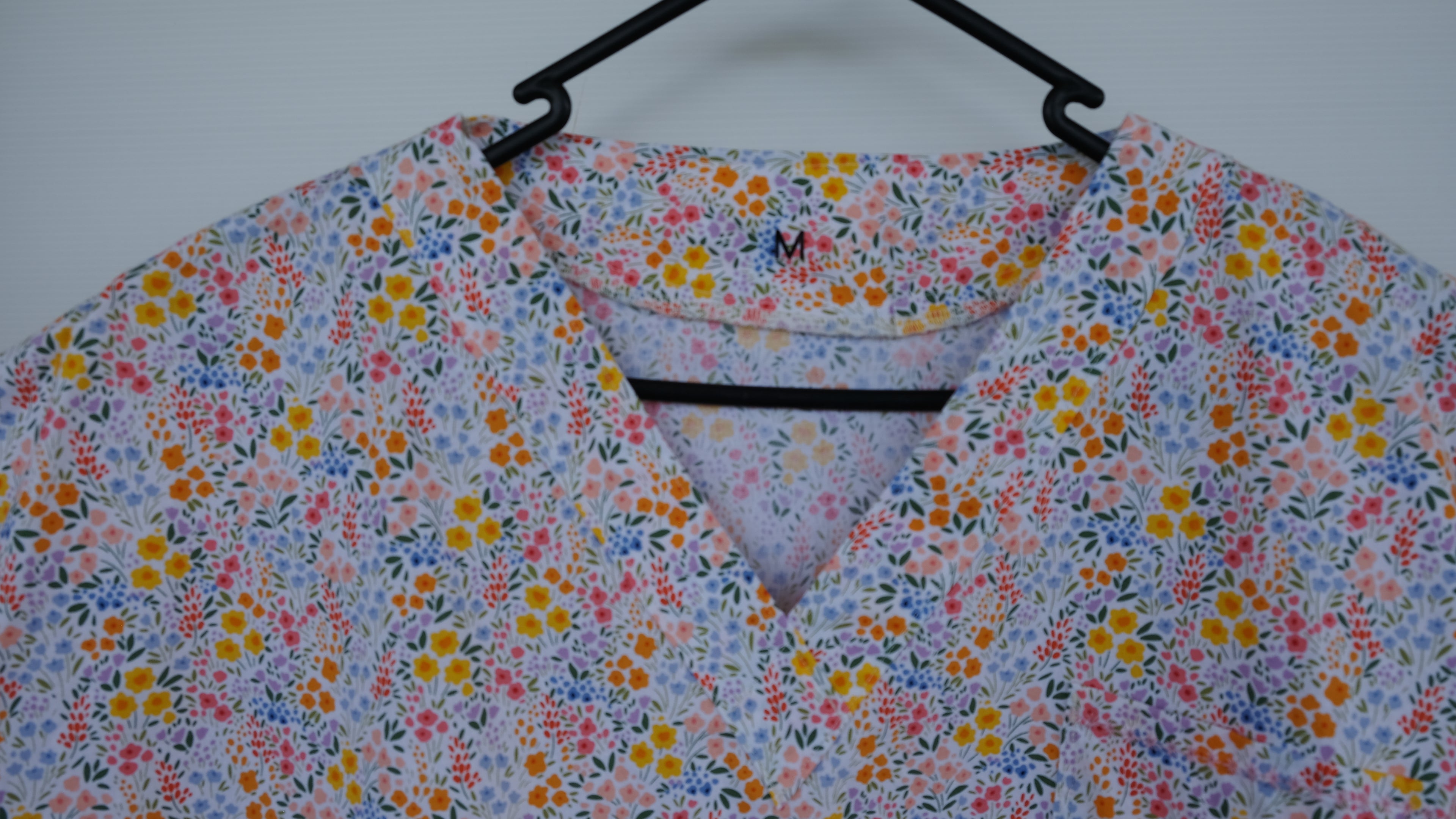 PASTEL FLORAL SCRUB TOP (READY MADE)